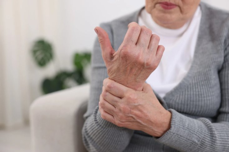 Senior woman with arthritis — reflexology support